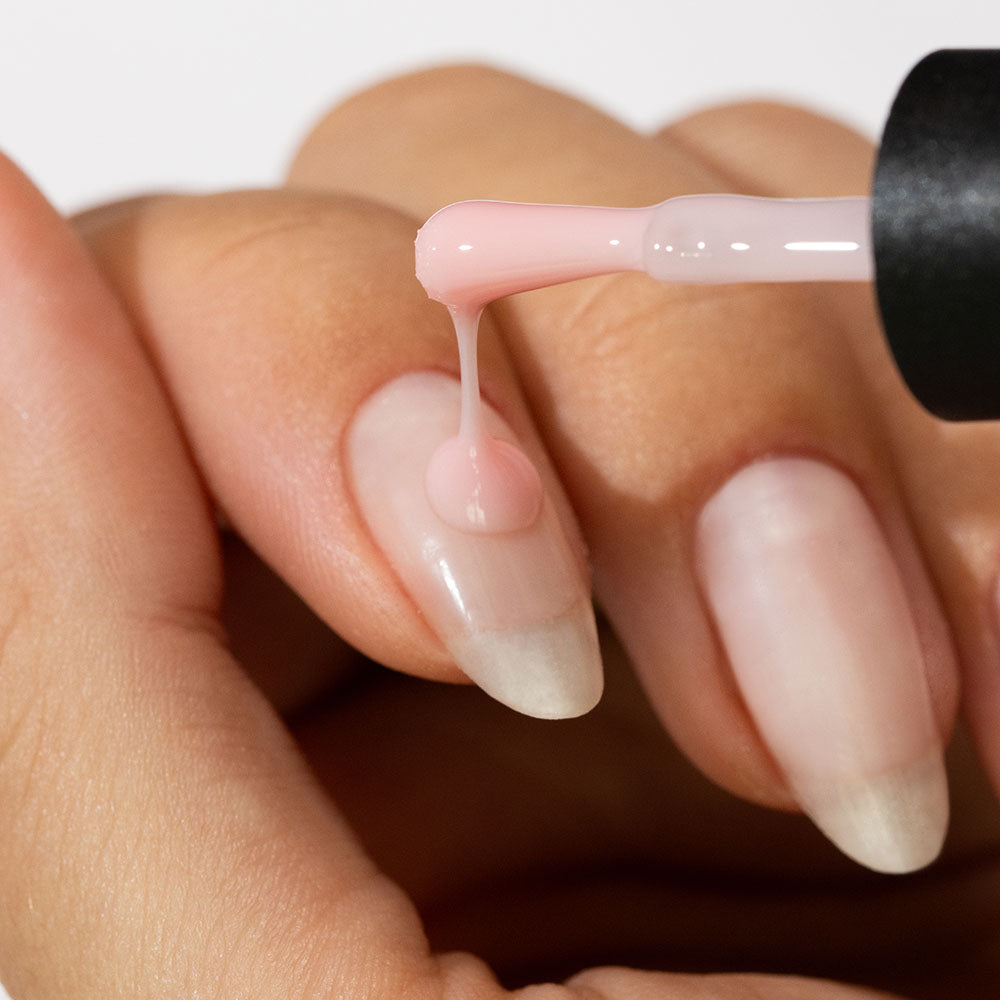 Gelous Pink Rubber Base Coat gel nail polish - photographed in Australia on model