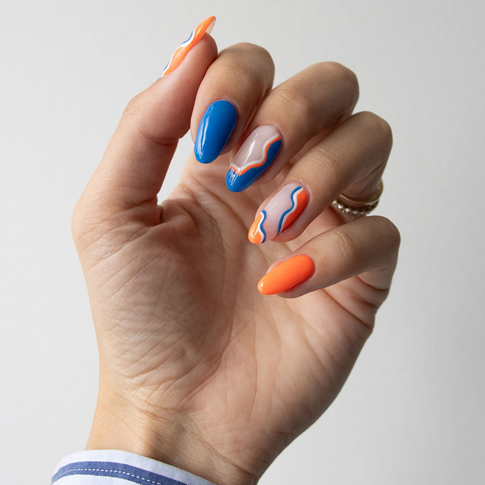 Gelous Neon Tangelo gel nail polish - photographed in Australia on model