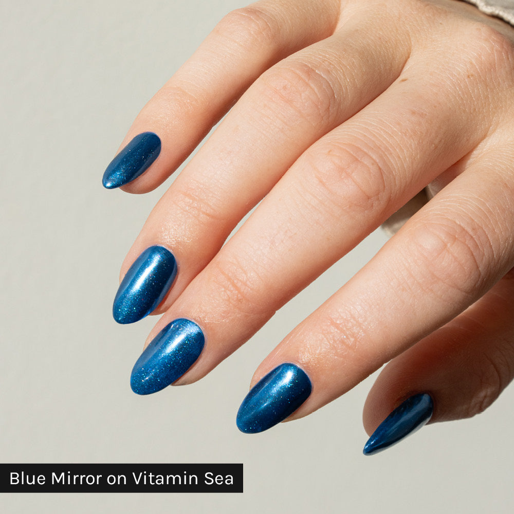 Gelous Blue Mirror Chrome Powder Swatch on Black Out - photographed in Australia on model
