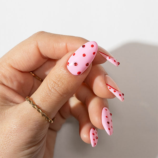 Polka dot and rhinestone gel nail art - photographed in Australia on model