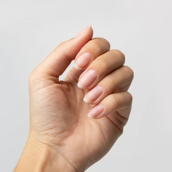 Bare nails before applying Gelous Nail Tips with Clear Rubber Base Coat - photographed in Australia on model