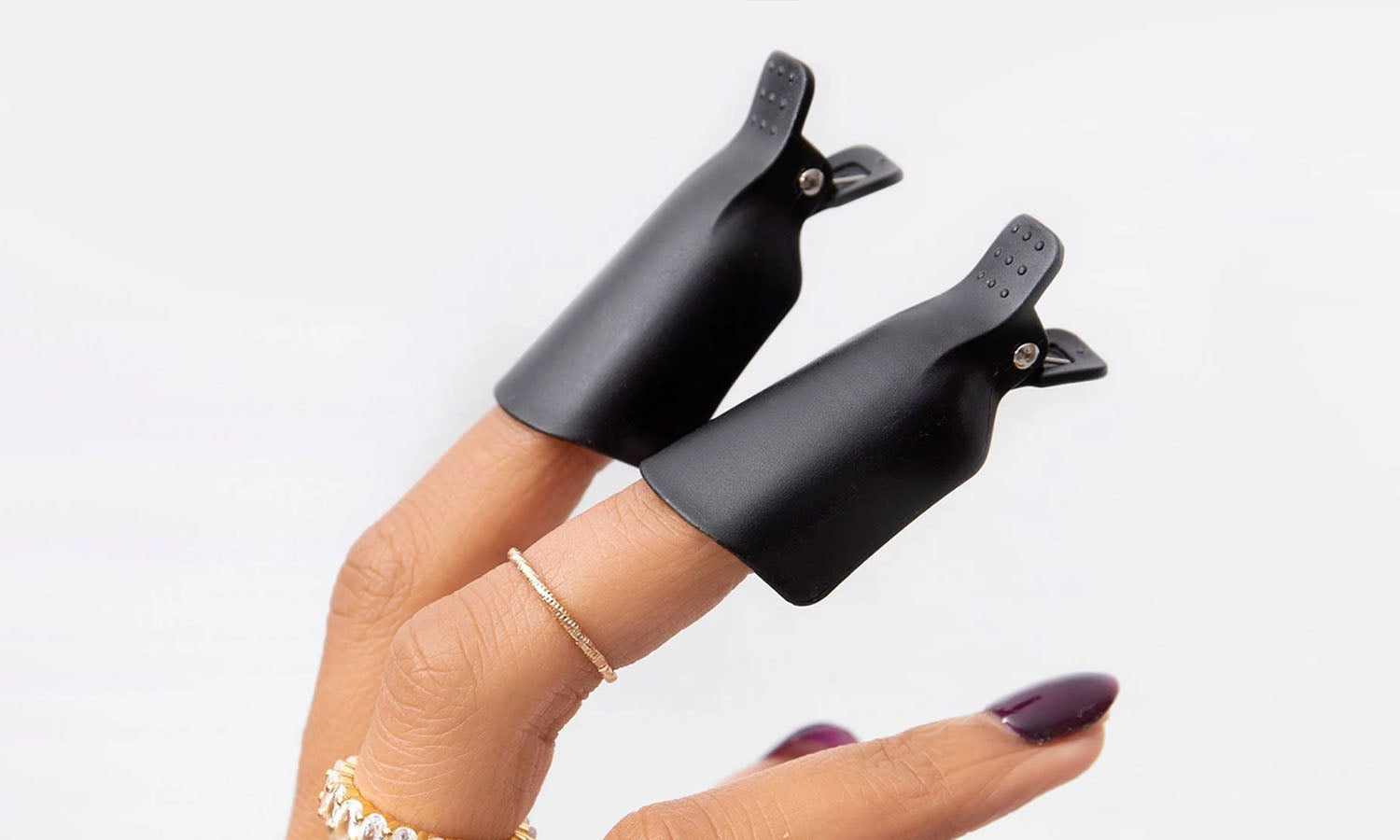 Removing your Gel Nail Polish with Manicure Removal Clips - photographed in Australia on model