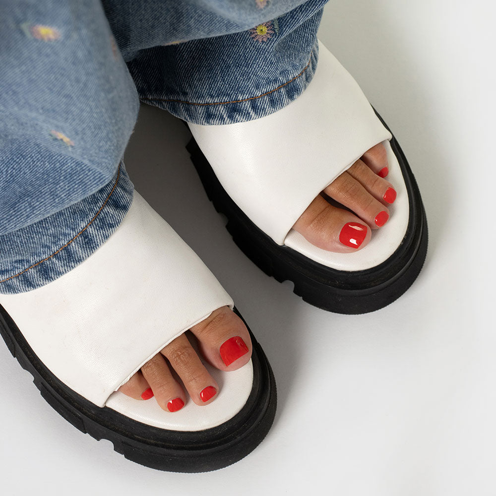 Gelous Red 3-in-1 pedicure polish - photographed in Australia on model