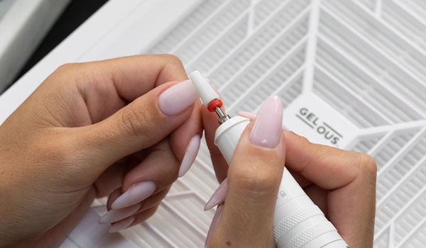 Removing Gel Nail Polish using your E-File Pen and Dust Collector - photographed in Australia