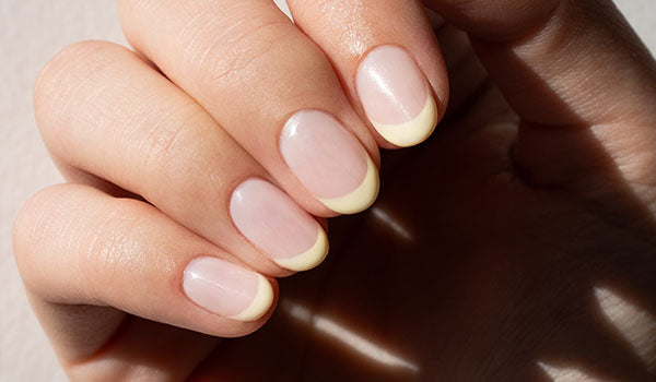 How to apply French tips for a French manicure at home - photographed on model in Australia