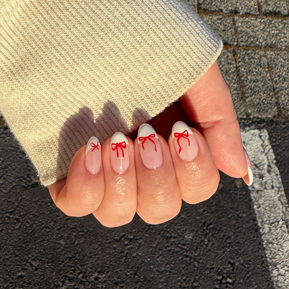 Gelous Red Bows Nail Art Stickers product photo - photographed in Australia on model