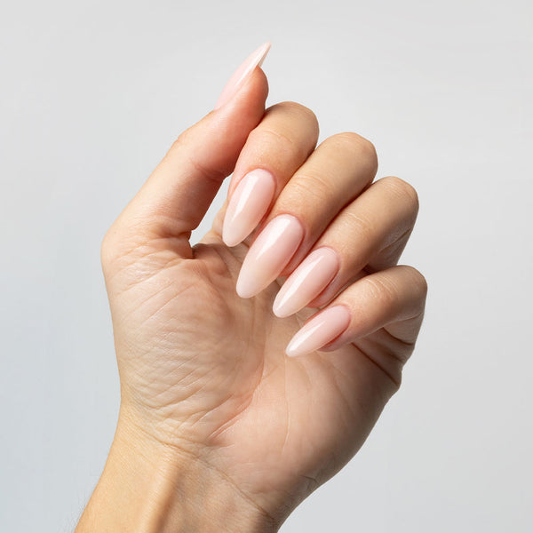 Sheer Pink Nail Tips applied with Clear Rubber Base Coat - photographed in Australia on model