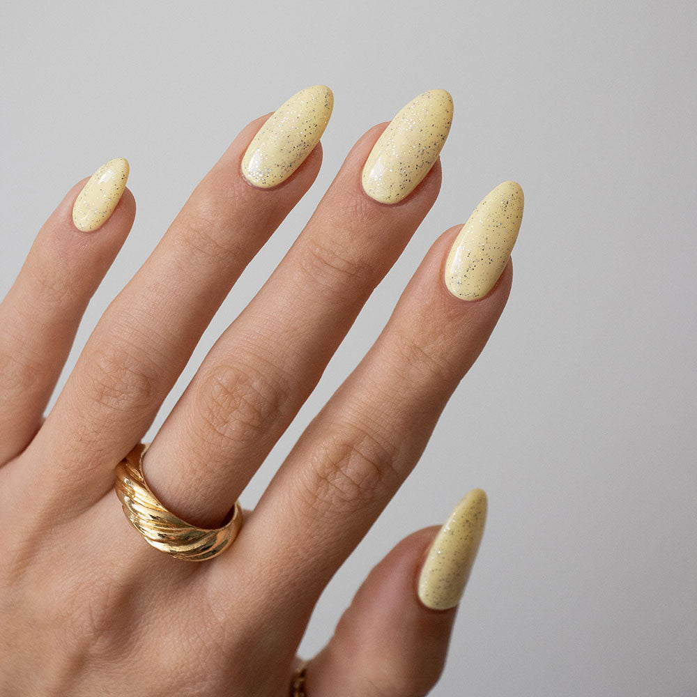 Gelous Fine Glitter Top Coat gel nail polish on model - photographed in Australia