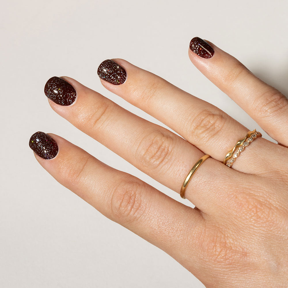 Gelous Fine Glitter Top Coat gel nail polish on model - photographed in Australia