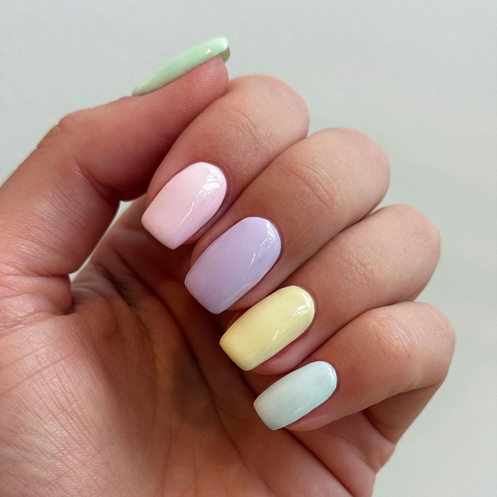 Gelous Milky Top Coat gel nail polish on model - photographed in Australia